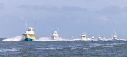 The 2026 Carolina Billfish Classic sportfish fleet running out of Charleston Harbor on Day 3 en route to the offshore grounds where Star Fish would extend into the cumulative lead.
