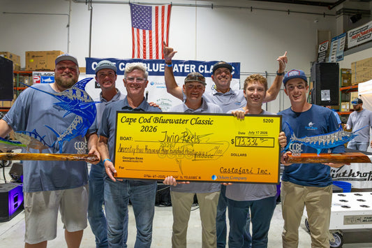 Twin Reels crew with their winner check and billfish trophies at the 2026 Cape Cod Bluewater Classic