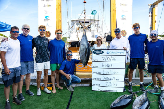 Team Honu crew with a yellowfin tuna at the 2026 Cape Cod Bluewater Classic weigh station in Falmouth MA