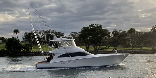 Taylor Jean, the 2022 62' Viking sportfisher captained by Blaine Birch — profile shot cruising the inlet (courtesy Taylor Jean Sportfishing)