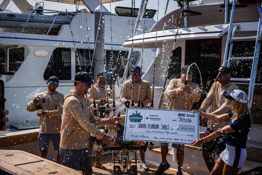 South Florida Sails spray champagne with the first-place check at the 2026 SFC Cape Cod Invitational